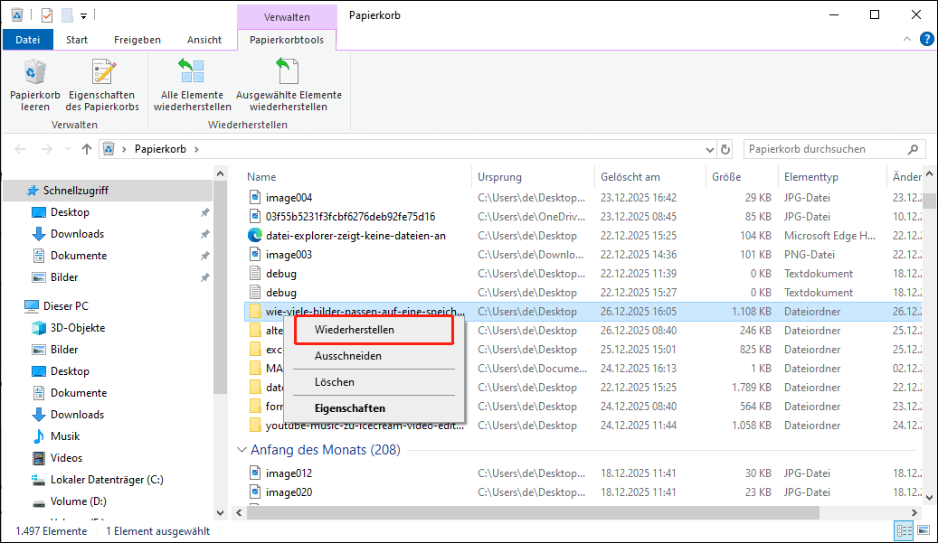 Die Oberfläche des Papierkorbs zeigt mehrere ausgewählte Dateien, wobei die Option Wiederherstellen hervorgehoben ist.