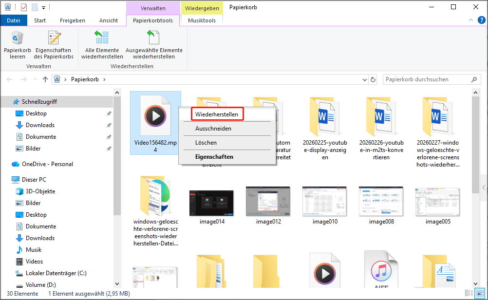 Papierkorb-Oberfläche mit ausgewählten Videodateien und der Wiederherstellen-Option im Kontextmenü.