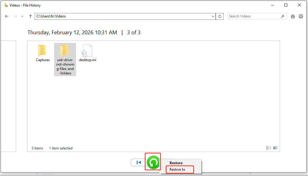 The File History interface showing the backups, with the Restore and Restore to buttons highlighted.
