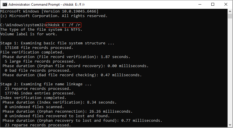 The Command Prompt window showing the operation process of the CHKDSK command to check for disk errors.