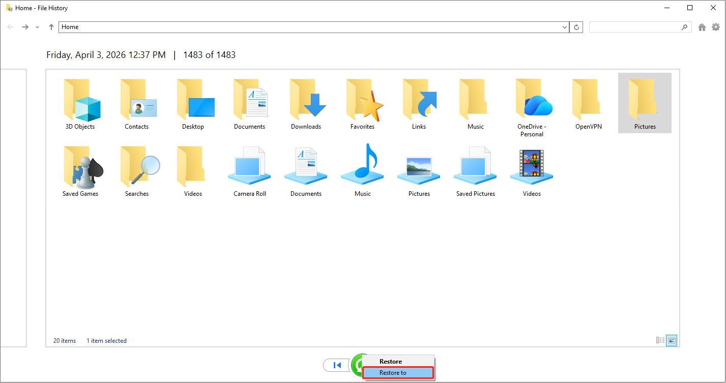 File History interface showing all backup files with the Pictures folder and the Restore to option selected.