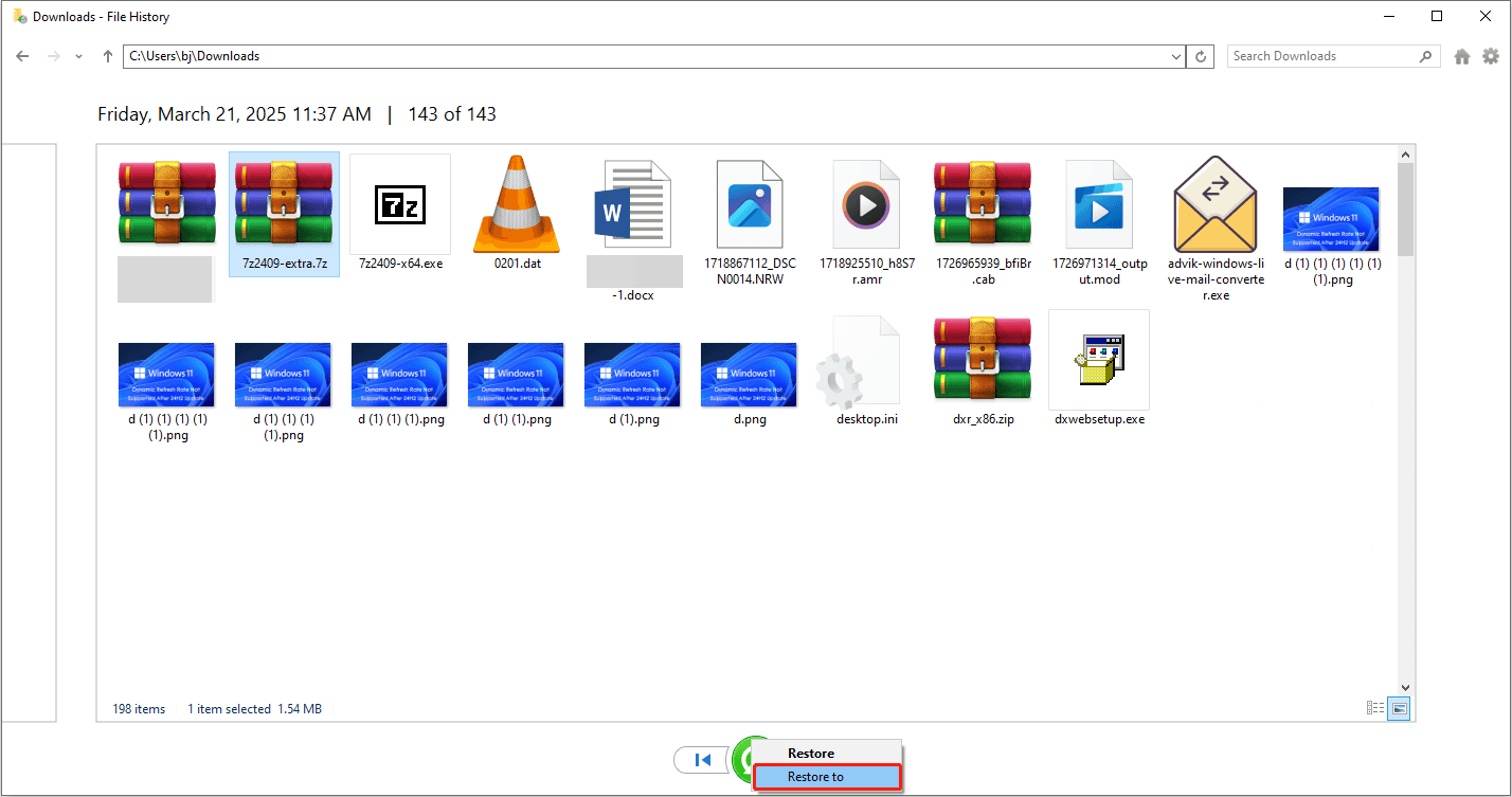File History interface showing a list of backup files with the target file and the Restore to option selected.