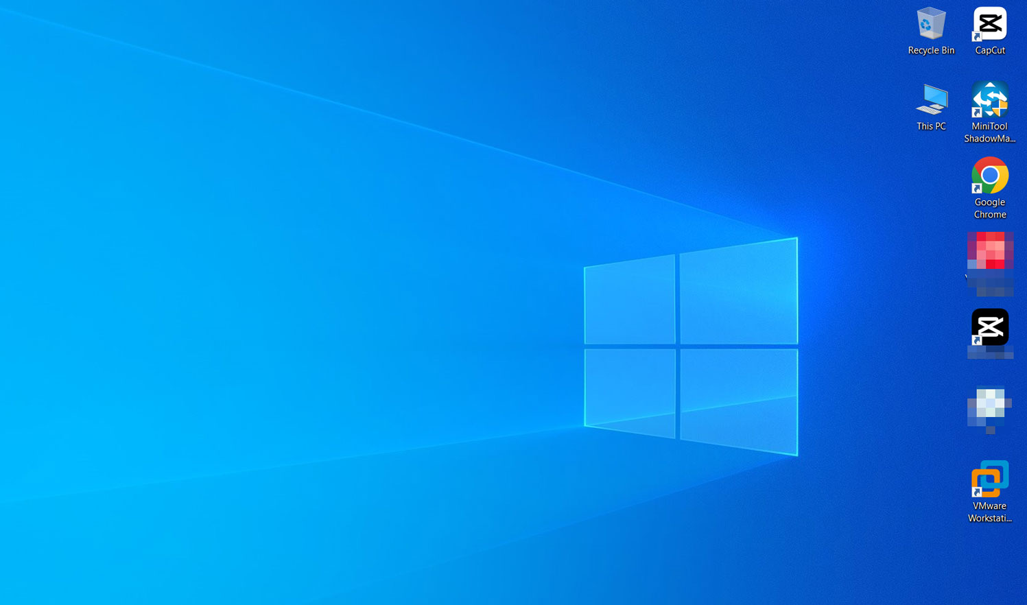 The desktop with missing files after Windows 10 reboot and only app icons.