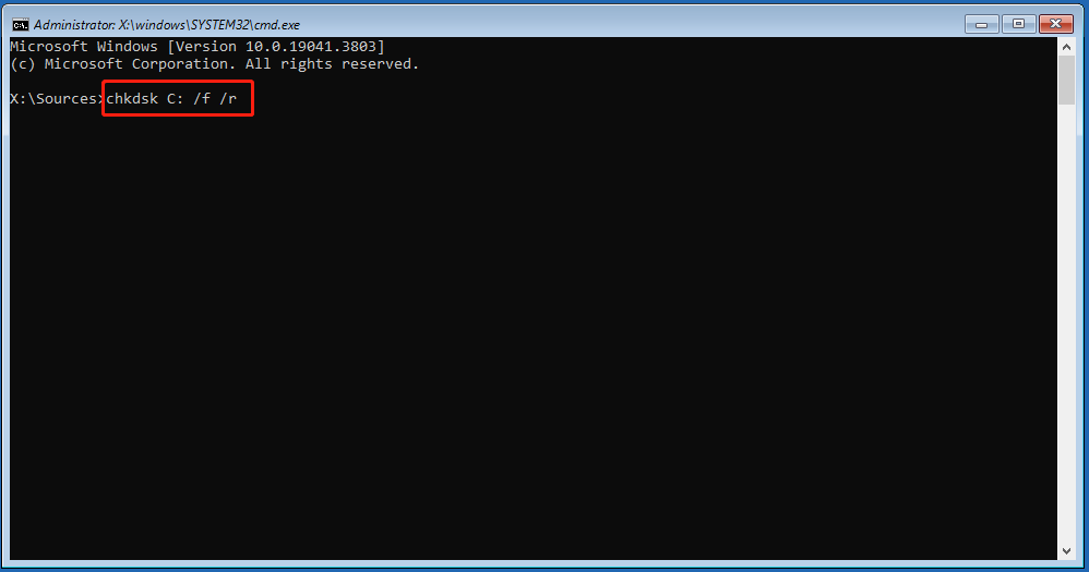 The Command Prompt window in WinRE with selected CHKDSK command.