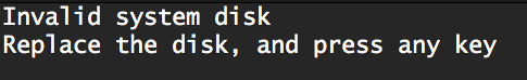 Screenshot of “Invalid system disk. Replace the disk, and press any key” error message.